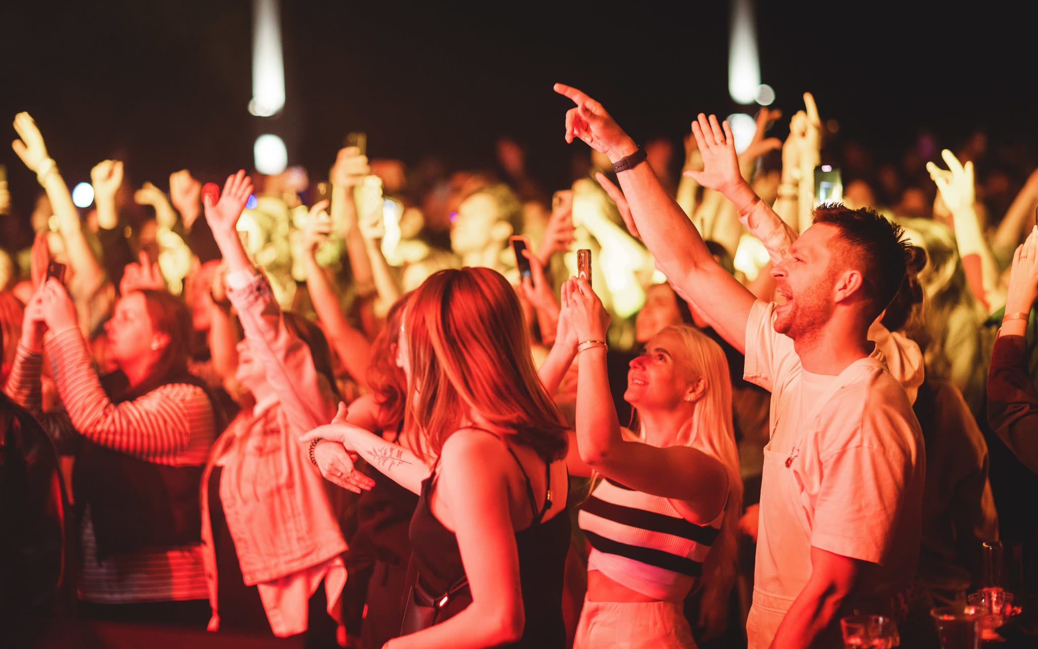 A crowd of people dancing